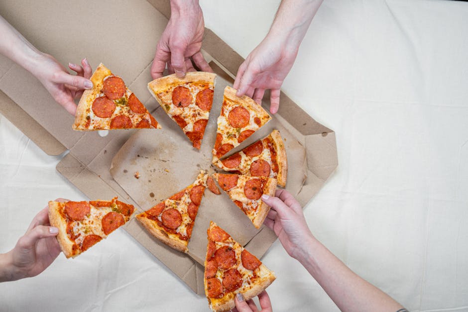 Friends sharing a delicious pepperoni pizza, creating a warm and inviting atmosphere