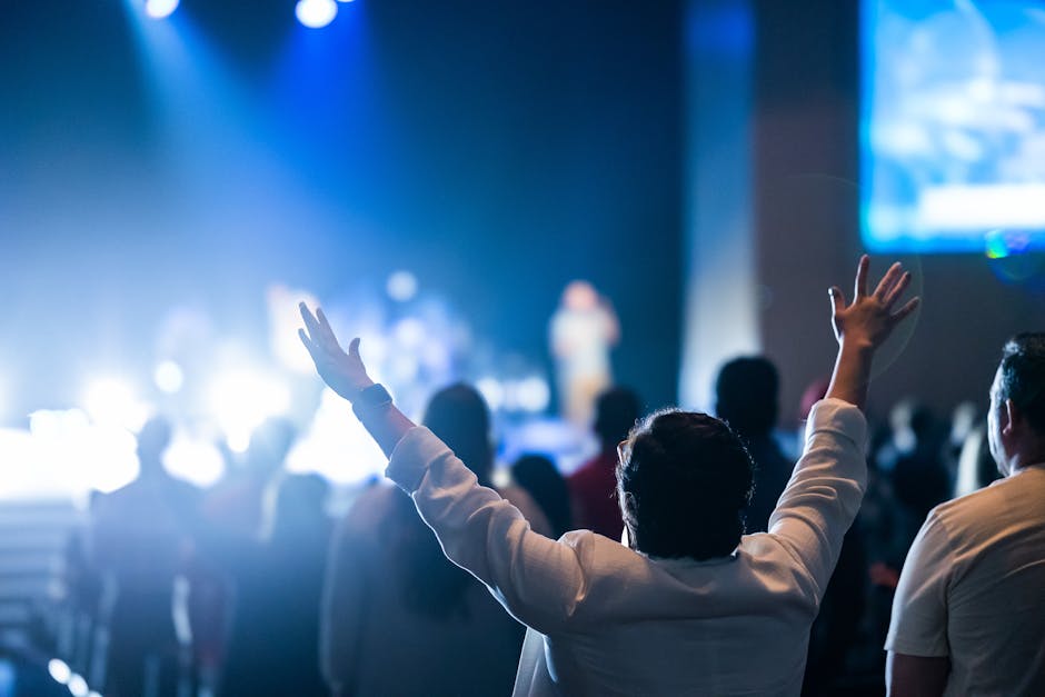 Exciting live concert scene with an enthusiastic audience enjoying the performance.